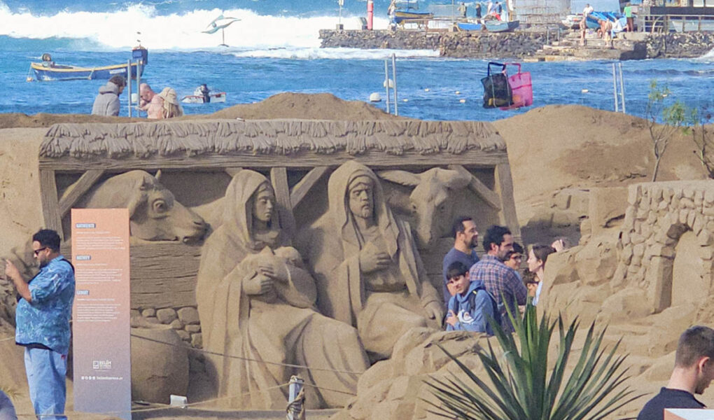 Belén de Arena, the nativity scene made of sand, representing Holy Family, with Mary, Joseph, and baby Jesus, installed at Playa de las Canteras in Las Palmas de Gran Canaria, Spain; photo by Ivan Kralj.