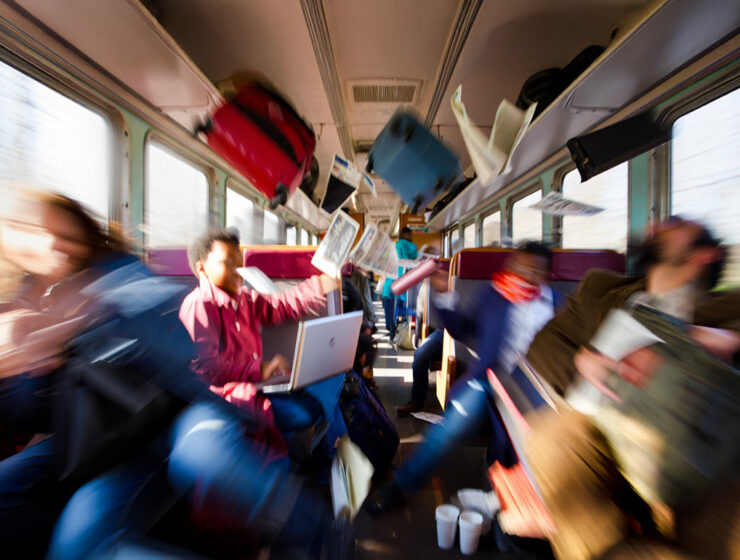 Train passengers in motion blur with flying objects during a train accident; an AI illustration for a practical guide on how to survive a train crash by Ivan Kralj / Reve, Adobe.