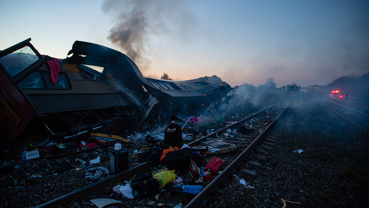 Aftermath chaos of a train crash with scattered wreckage; AI image by Ivan Kralj / Reve.