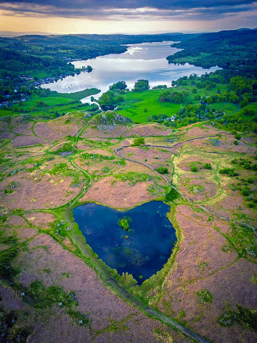 Loughrigg Fell Ambleside, a heart-shaped lake in United Kingdom; photo by Jonny Gios, Unsplash.