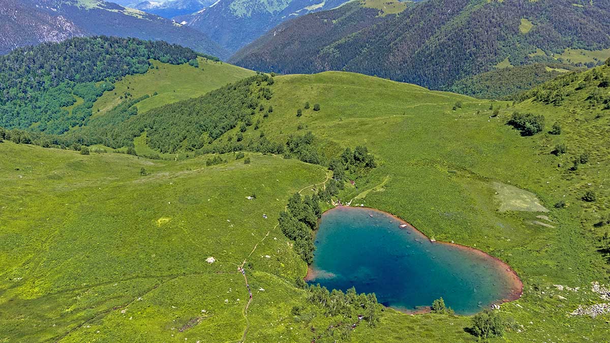 Ozero Lyubvi, a heart-shaped lake on the Morg-Syrty Plateau in Russia; photo by Alexey Elfimov, Unsplash.