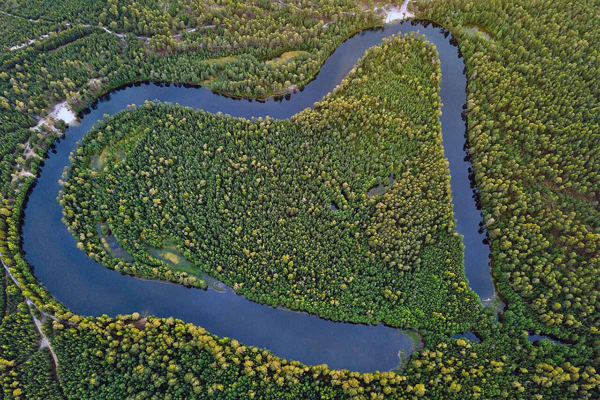 Serdce Yugry, a heart-shaped oxbow lake in Kogalym, Russia; photo by Ted.ns.