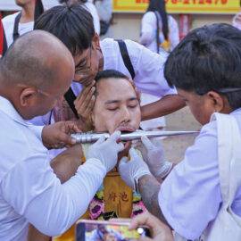 The cheek-piercing ritual at Lim Hu Tai Su Shrine during the Phuket Vegetarian Festival; photo by Ivan Kralj.