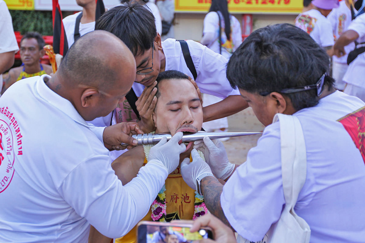 The cheek-piercing ritual at Lim Hu Tai Su Shrine during the Phuket Vegetarian Festival; photo by Ivan Kralj.
