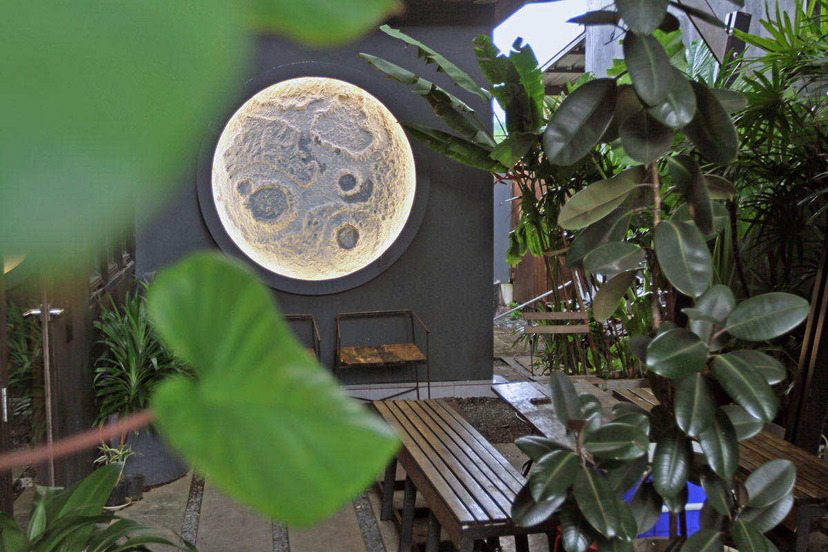 Backlit 3D moon sculpture in the garden of the Shade House - Phuket Downtown hostel, Thailand; photo by Ivan Kralj.