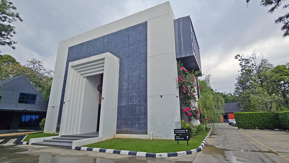 The black-and-white exterior of the modern building housing Thai Oasis Spa School in Chiang Mai, Thailand; photo by Ivan Kralj.