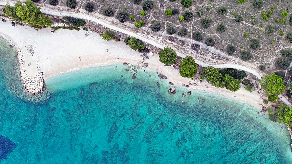 Aerial view of Baška Voda FKK Beach on Makarska Riviera, Croatia; photo by Ivan Kralj.