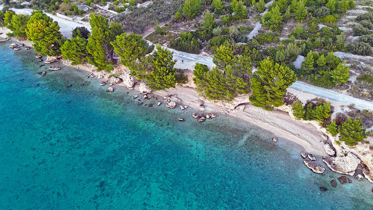 Aerial view of Cvitačka FKK Beach on Makarska Riviera, Croatia; drone photo by Ivan Kralj.