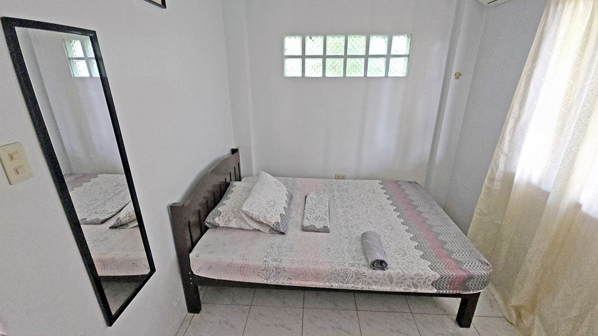 A simple room at the D'Downhill Place, an accommodation property in Oslob, on the island of Cebu, the Philippines, known for its whale shark tourism; photo by Ivan Kralj.