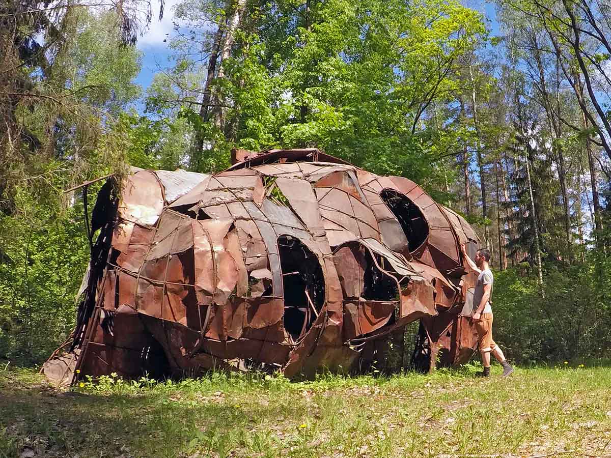Macbeth's "Lying Head", a gigantic sculpture made by Adomas Jacovskis, lying in the forest of Europos Parkas, the geographical center of Europe, near Vilnius, Lithuania; photo by Ivan Kralj.