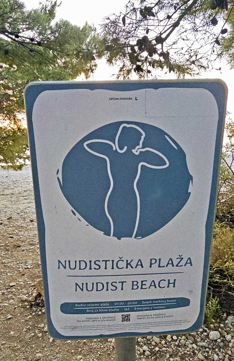 The nudist beach sign at Dračevac, one of the best naturist beaches on Makarska Riviera, Croatia; photo by Ivan Kralj.