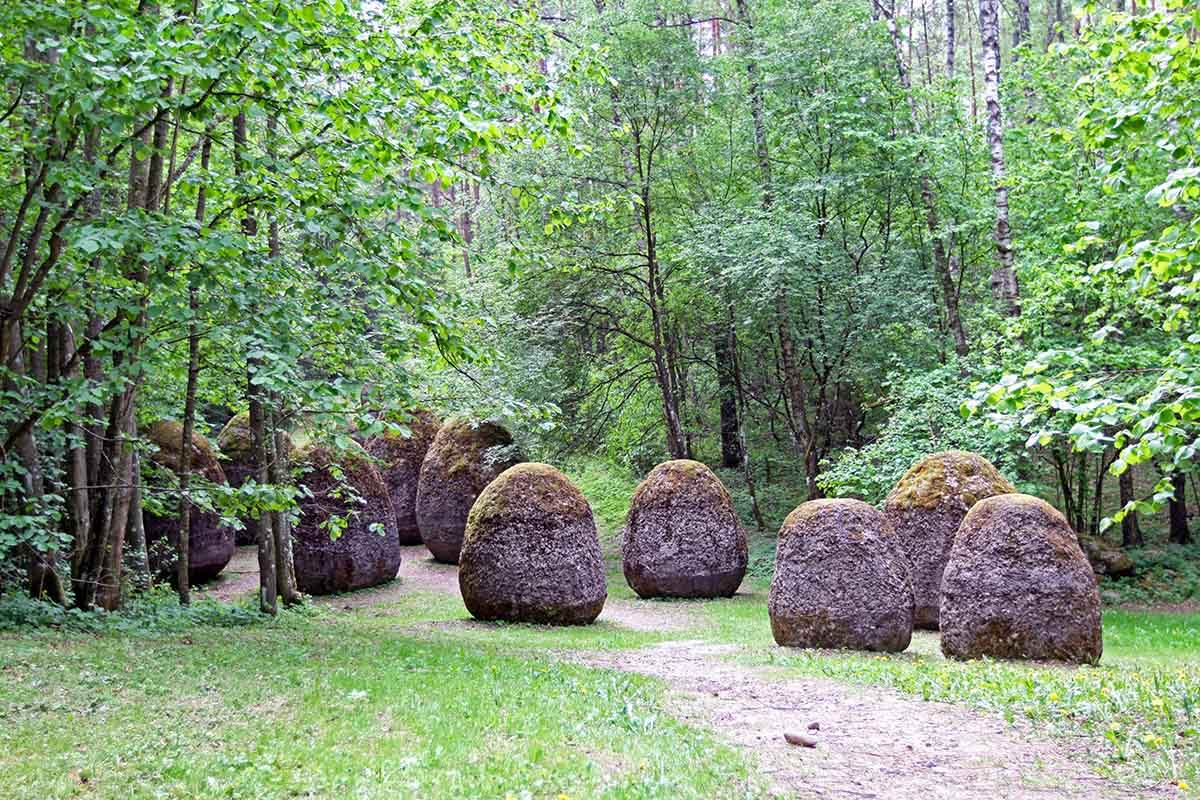 Egg-shaped sculptures in the forest near Vilnius, Lithuania, at Europos Parkas, the geographical center of Europe - artwork "Space of Uknown Growth" by Magdalena Abakanowicz; photo by Ivan Kralj.