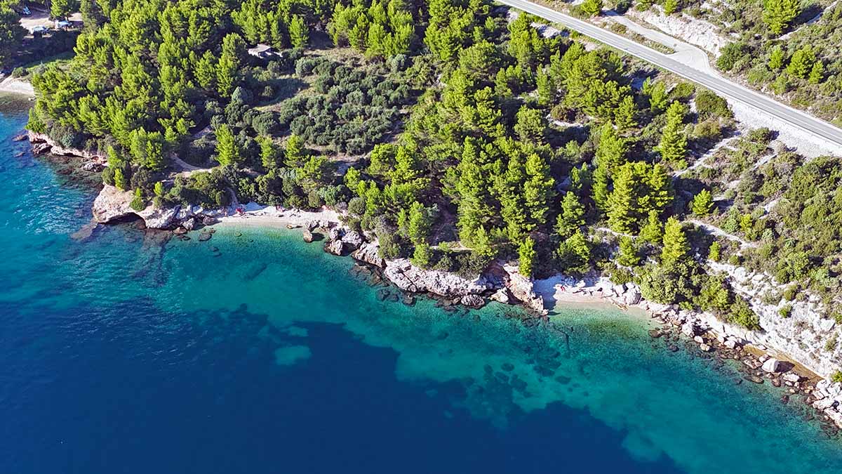 Aerial view of Beach FKK and West Secluded FKK Beach in Drvenik area, Makarska Riviera, Croatia; drone photo by Ivan Kralj.