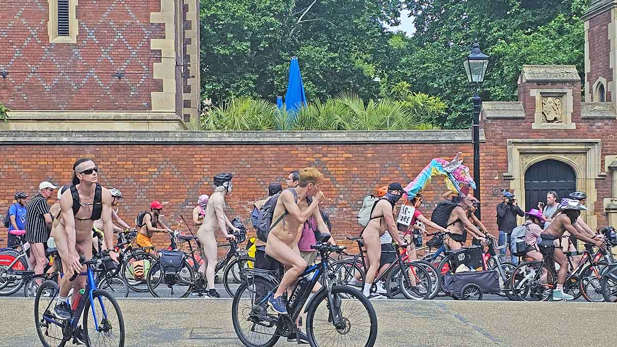 Nude men riding bicycles in London, UK, during the World Naked Bike Ride protest; photo by Ivan Kralj.